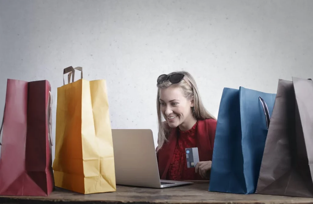 online shopper surrounded by bags
