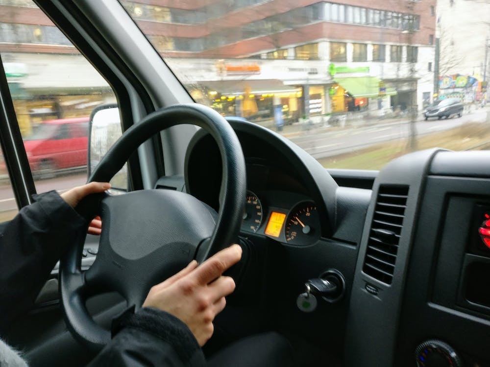man driving a van