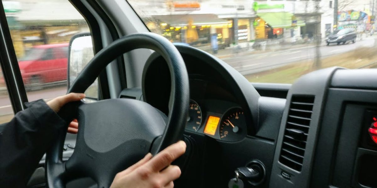 man driving a van